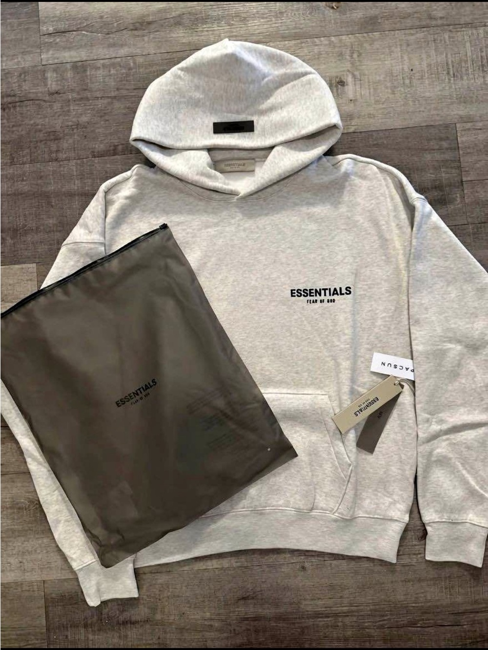 New Essentials Light Gray Pullover Hoodie with dust bag